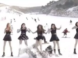 Snowboarder travolge un gruppo di ballerine durante le riprese di un videoclip su una pista da sci in Cina – VIDEO